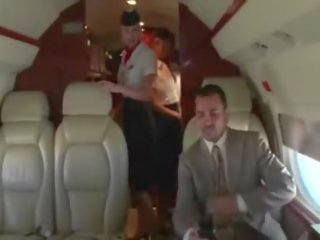 Randy stewardesses suck their clients hard putz on the plane