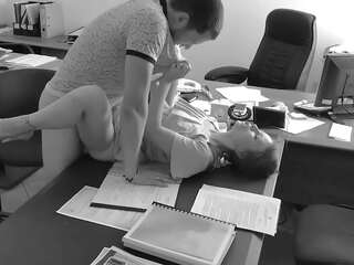 The boss fucks his tiny secretary on the office table and vids it on hidden camera